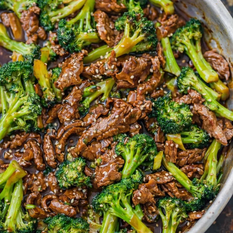 Delicious beef broccoli recipe with tender beef slices and vibrant broccoli in stir-fry sauce.