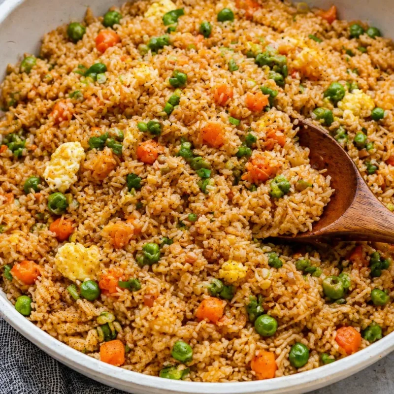 Delicious easy and simple fried rice recipe with eggs and veggies, ready in 20 minutes.