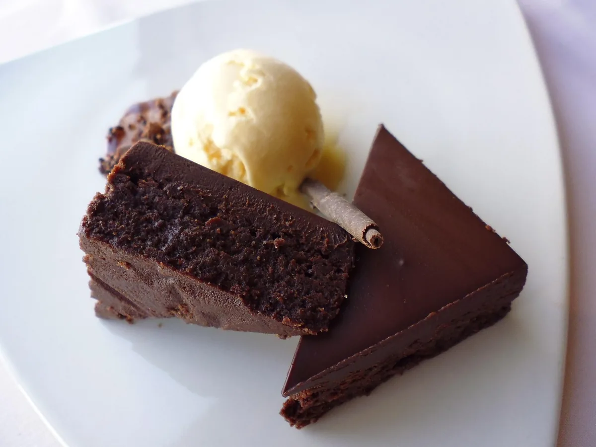 Warm chocolate dessert with a scoop of vanilla ice cream, a classic way to serve chocolate dump cake