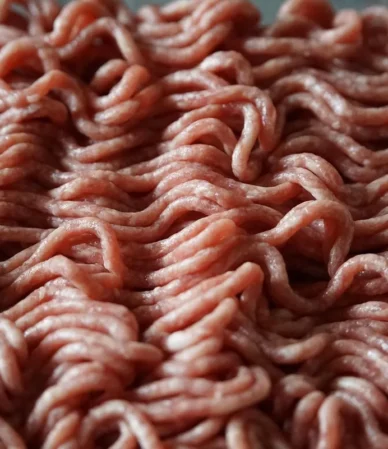 How to tell if ground beef is bad: close-up of fresh raw ground beef with a pink-red color