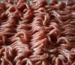 How to tell if ground beef is bad: close-up of fresh raw ground beef with a pink-red color