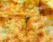 Golden, crisp-topped baked casserole cut into squares, similar to a Ritz cracker chicken casserole