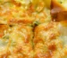 Golden, crisp-topped baked casserole cut into squares, similar to a Ritz cracker chicken casserole