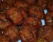 Close-up of browned, crisp-edged beef meatballs, similar to these air fryer meatballs