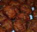 Close-up of browned, crisp-edged beef meatballs, similar to these air fryer meatballs