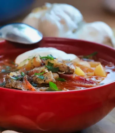 Bowl of beef and cabbage soup in a tomato broth, similar to the cabbage soup variation of these ground beef and cabbage recipes