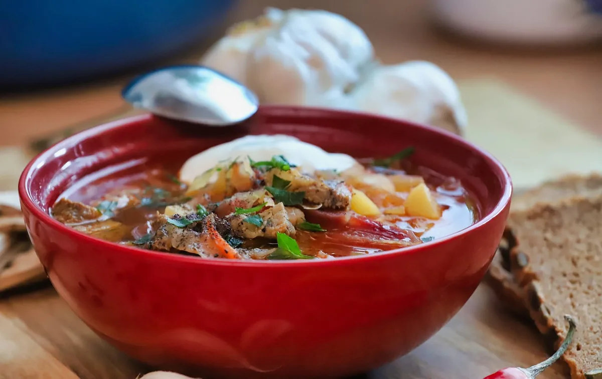 Bowl of beef and cabbage soup in a tomato broth, similar to the cabbage soup variation of these ground beef and cabbage recipes