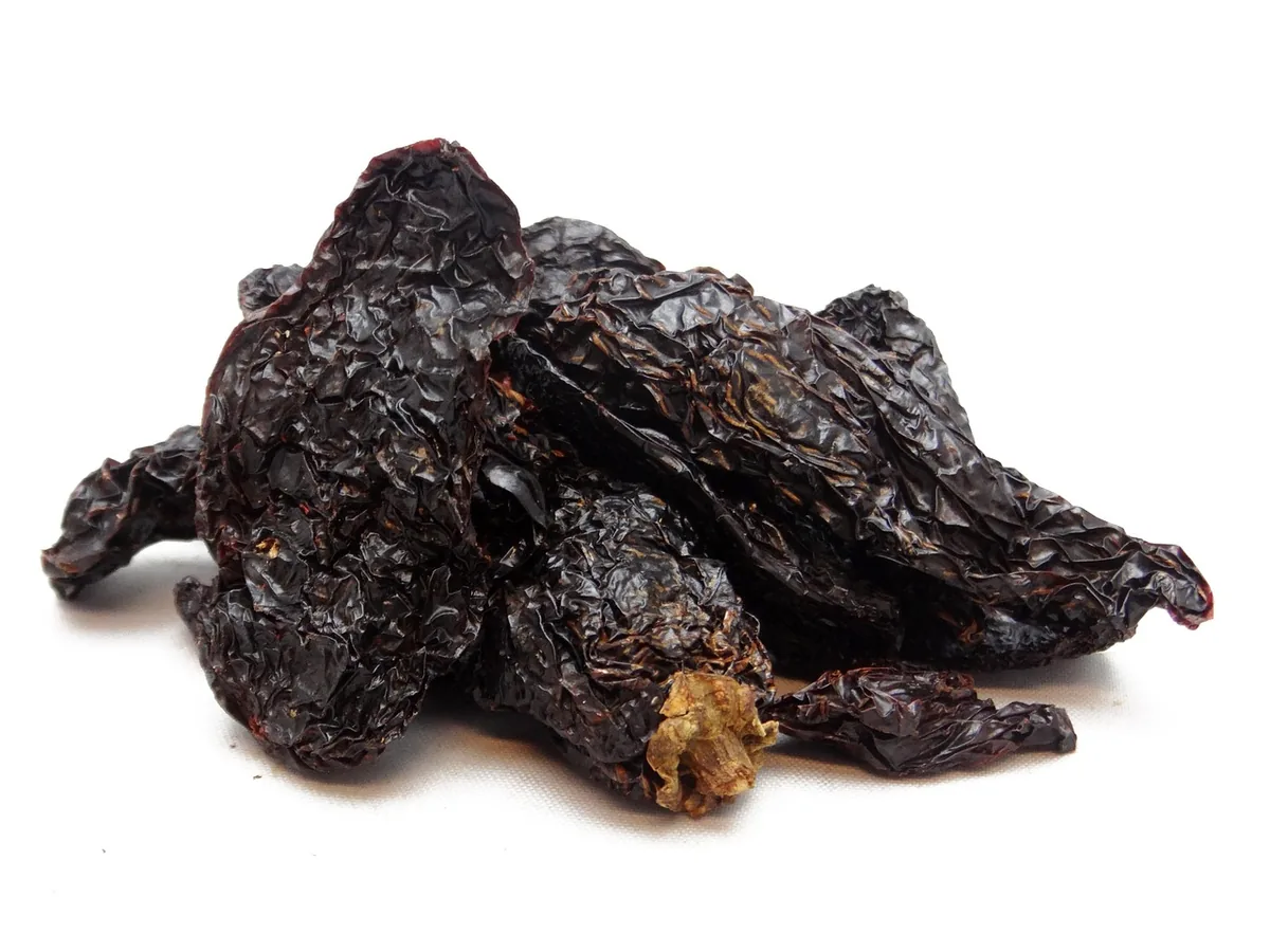 Dried chipotle peppers, the smoked jalapeños that are canned in adobo sauce for the chicken marinade