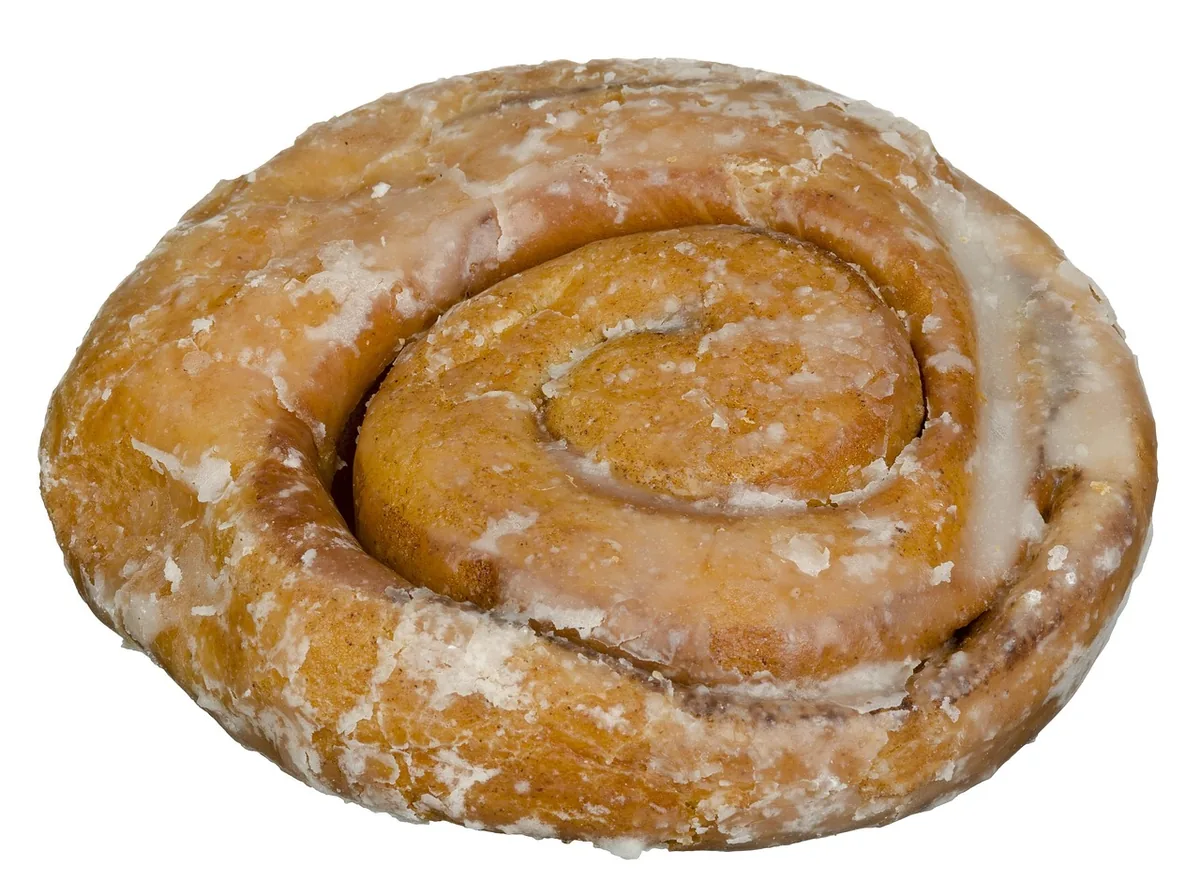 Glazed cinnamon swirl pastry, the honey bun flavor that this honey bun cake recipe copies in a sheet cake