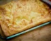 Puffed golden oven pancake with crisp browned edges in a baking dish, similar to this German pancake recipe