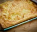 Puffed golden oven pancake with crisp browned edges in a baking dish, similar to this German pancake recipe