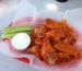 Buffalo wings with celery sticks and ranch, the flavors behind this buffalo chicken dip