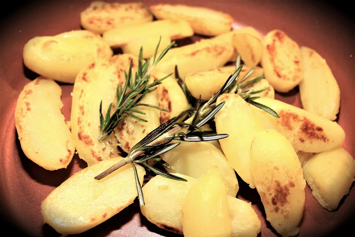 Crispy roasted potatoes with fresh rosemary, the side for steak and potatoes